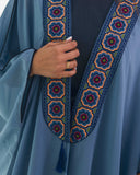 Embroidered front band detail on the Royal Bisht abaya — ASHI