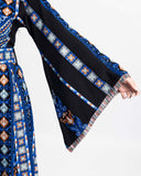 Blue Qalqilya-inspired tatreez embroidery on a black Palestinian thobe — ASHI